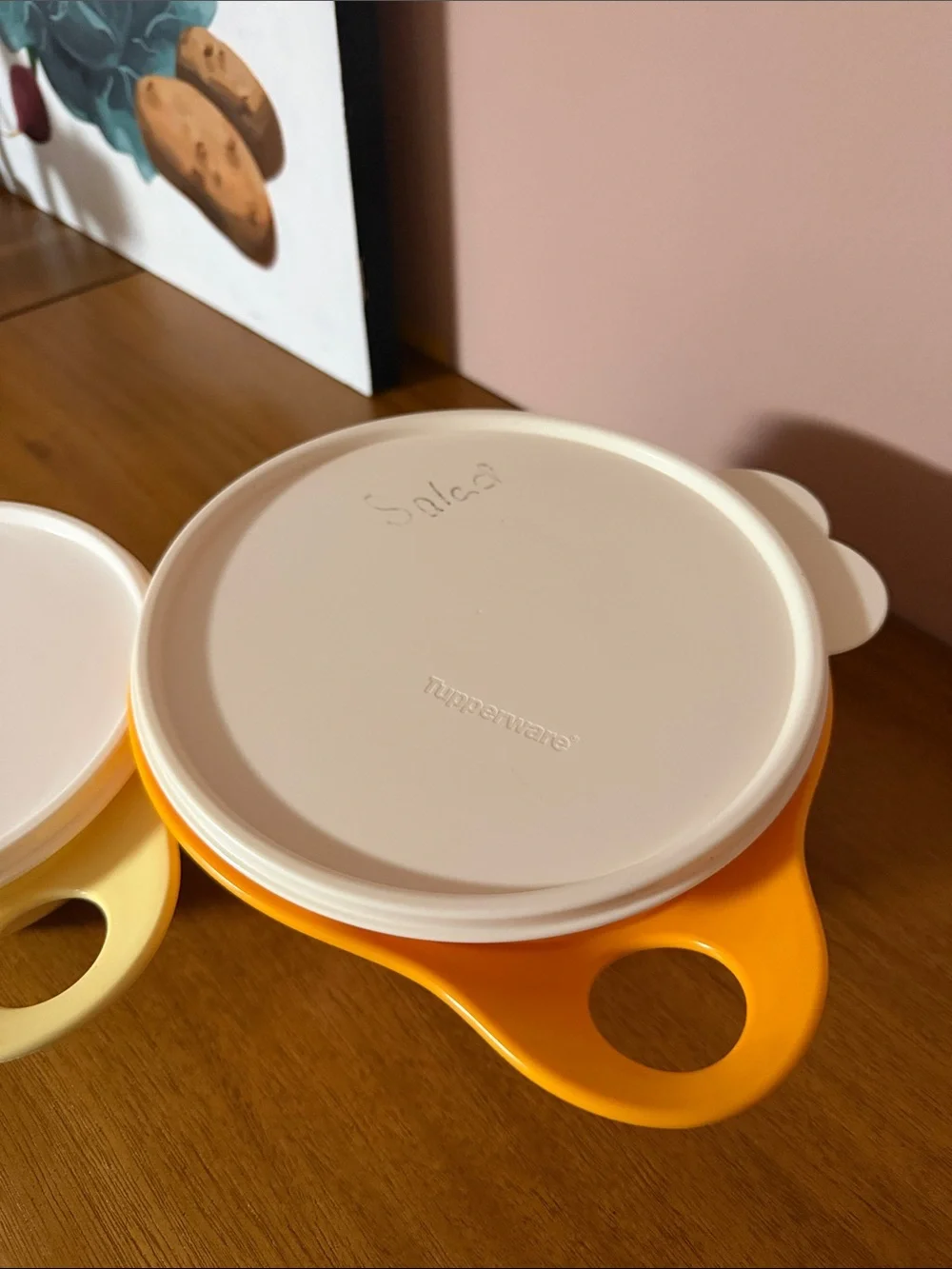 Tupperware Orange and Yellow Nesting Bowls with White Lids